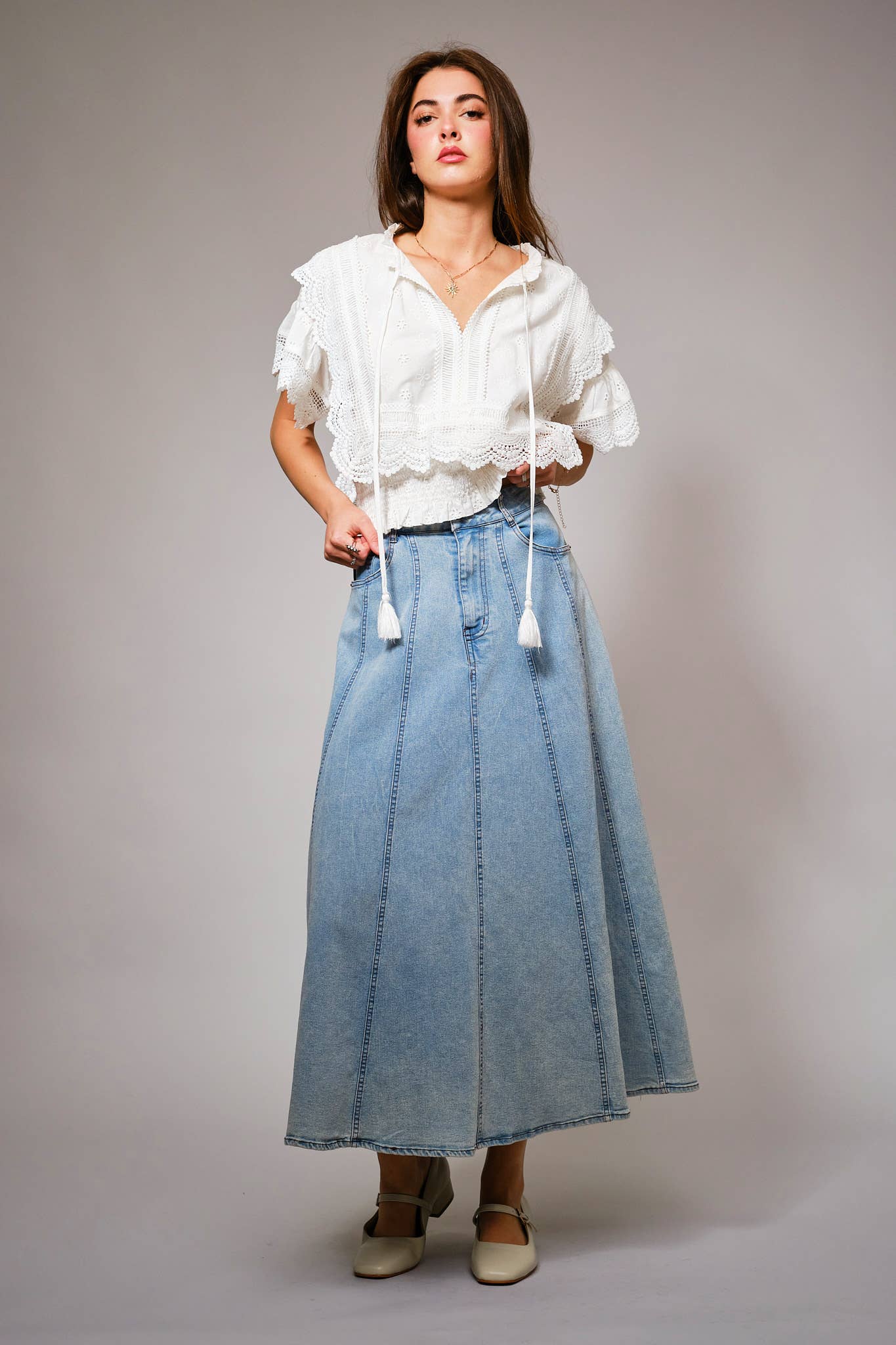 Eyelet Embroidered Tassel Tie Front Crop Top