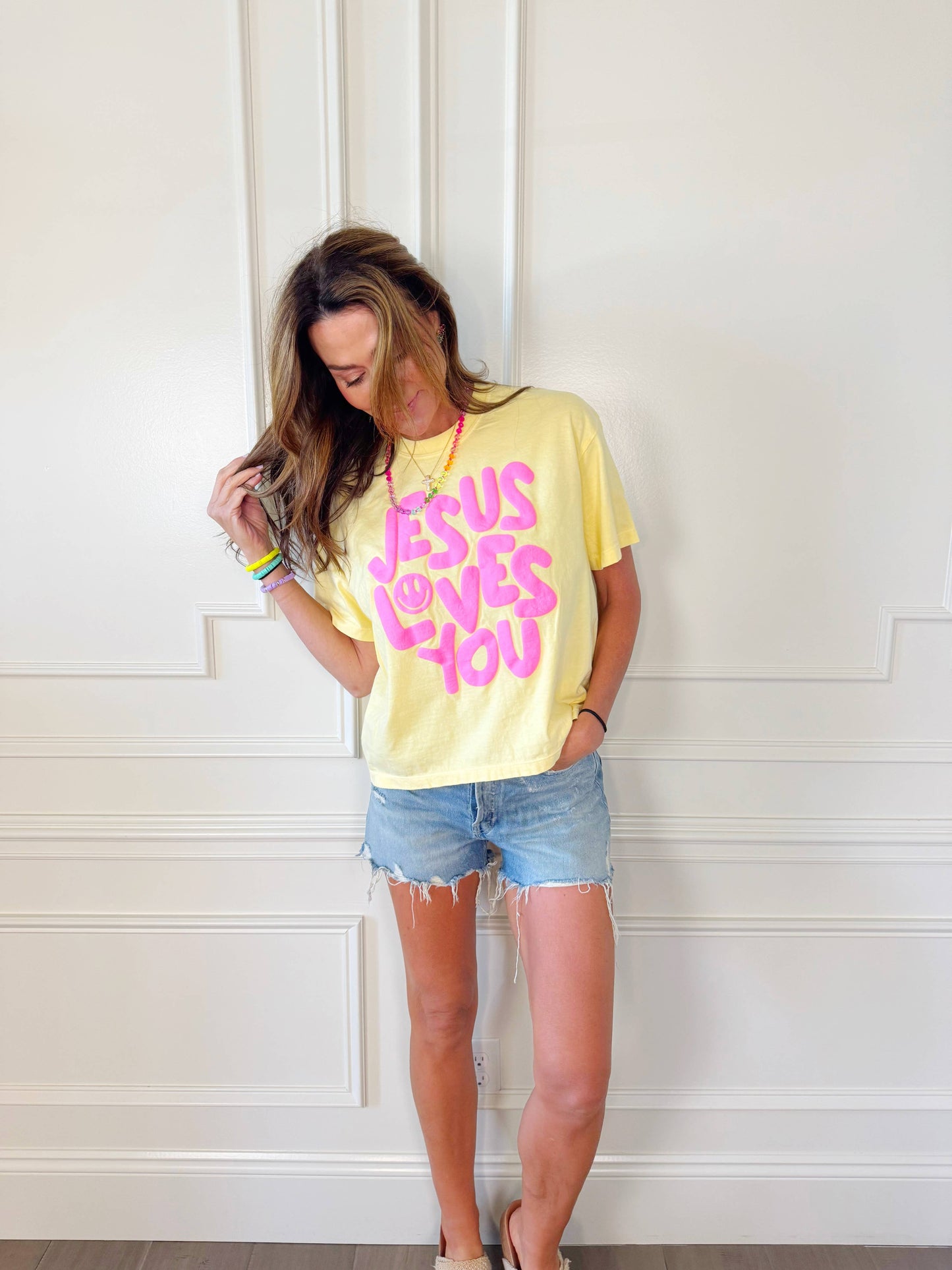 Neon Cantaloupe Smiley Jesus Loves You Puff Cropped Tee